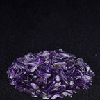 Amethyst crystal cluster on a black background