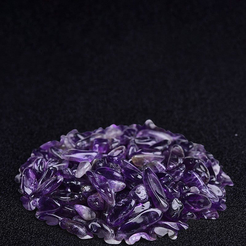 Amethyst crystal cluster on a black background