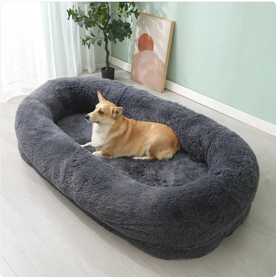 Plush winter pet bed in dark gray with corgi dog resting comfortably
