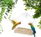 Window bird feeder with colorful hummingbirds feeding
