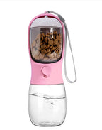 Portable pet water bottle in pink with attached drinking bowl

