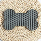 Gray silicone bone shaped slow feeder licking mat for dogs
