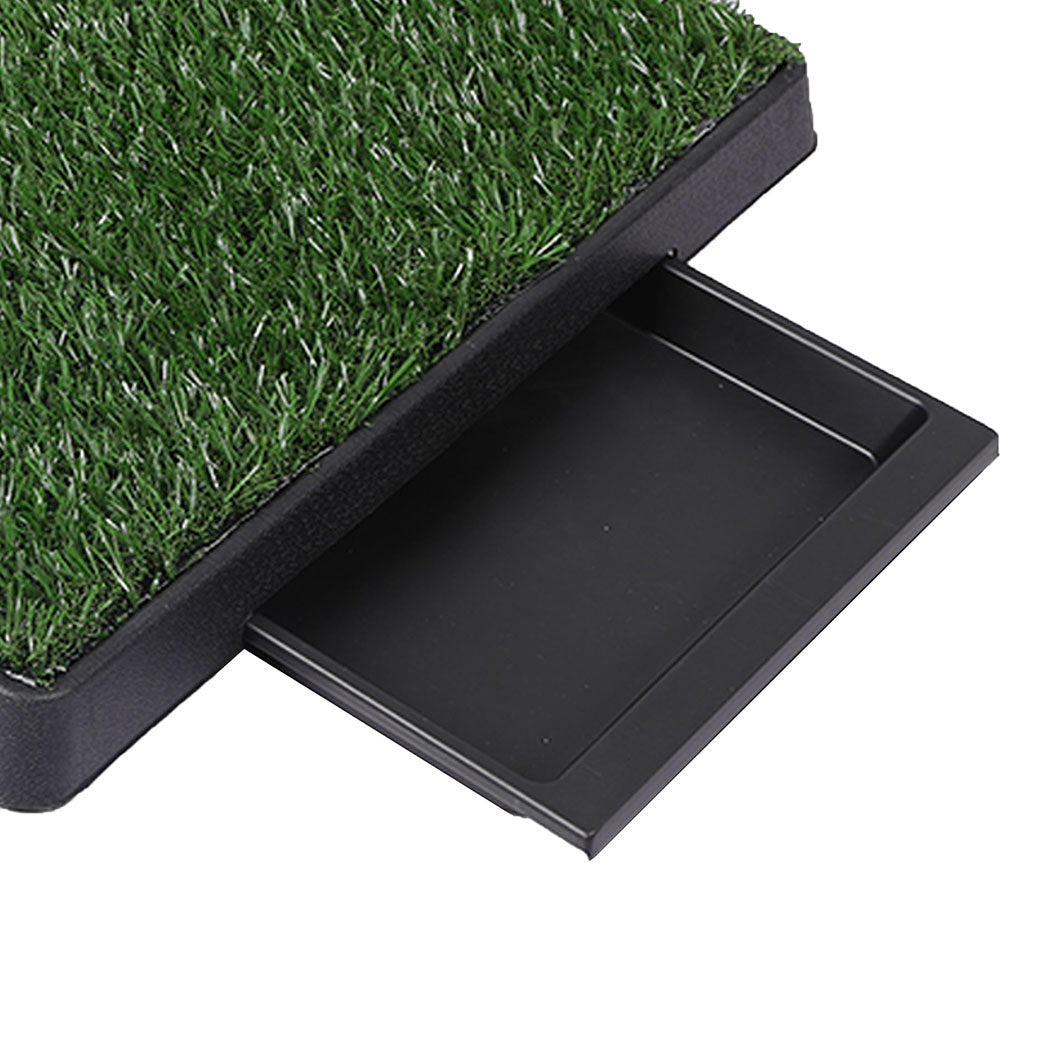 Pet pad with artificial grass surface and black base