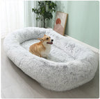 Large removable washable pet bed in light gray showing oval shape
