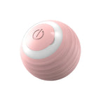 Interactive dog toy ball in pink with motion sensor technology
